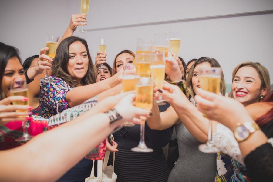 Picture of women toasting at an event for their company