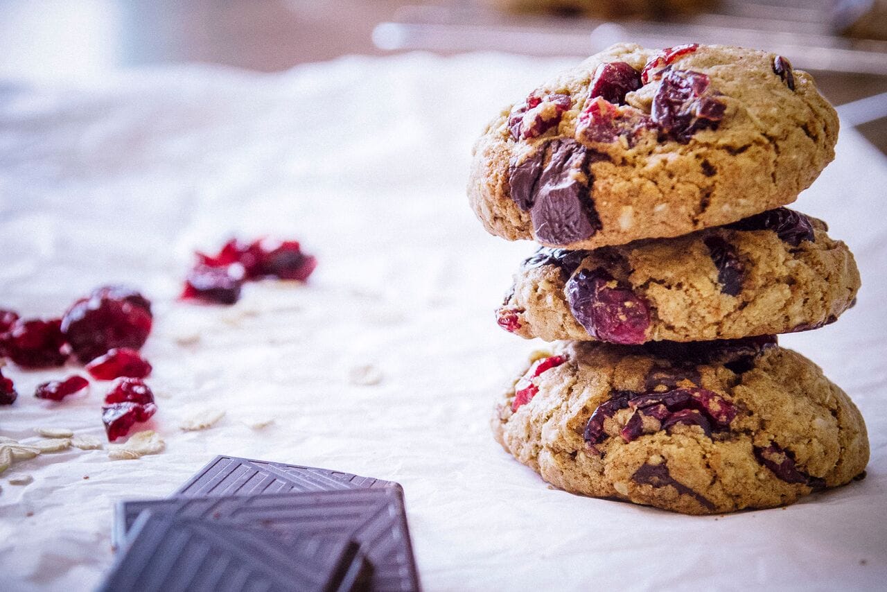Image of an oatmeal chocolate chip cranberry cookie shot by Amelia Robertson