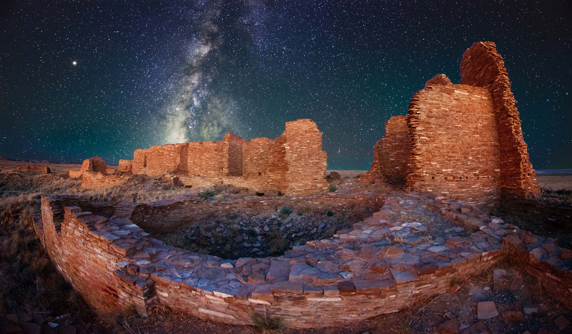 Image of ruins with the night sky and milky way in the background