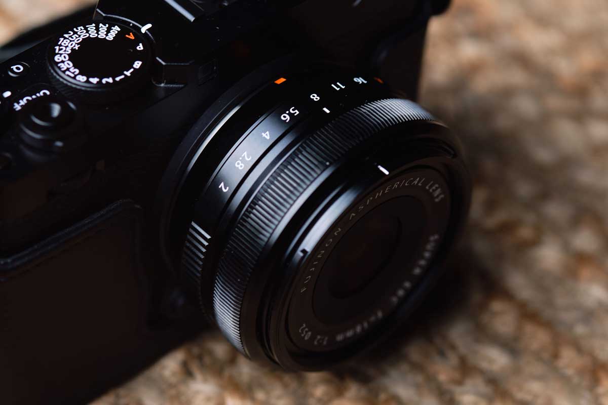 Image of the Fujifilm 18mm f/2 R on a Fujifilm rangefinder style camera